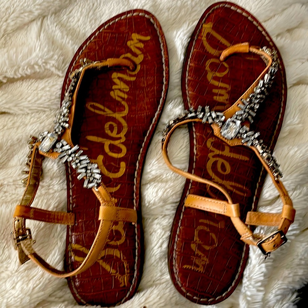 Sandals previously loved.None of the stones have fallen out. Still very wearable